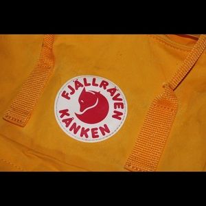 Fjällräven kånken yellow backpack